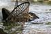 travel photography_ragged rope net above water